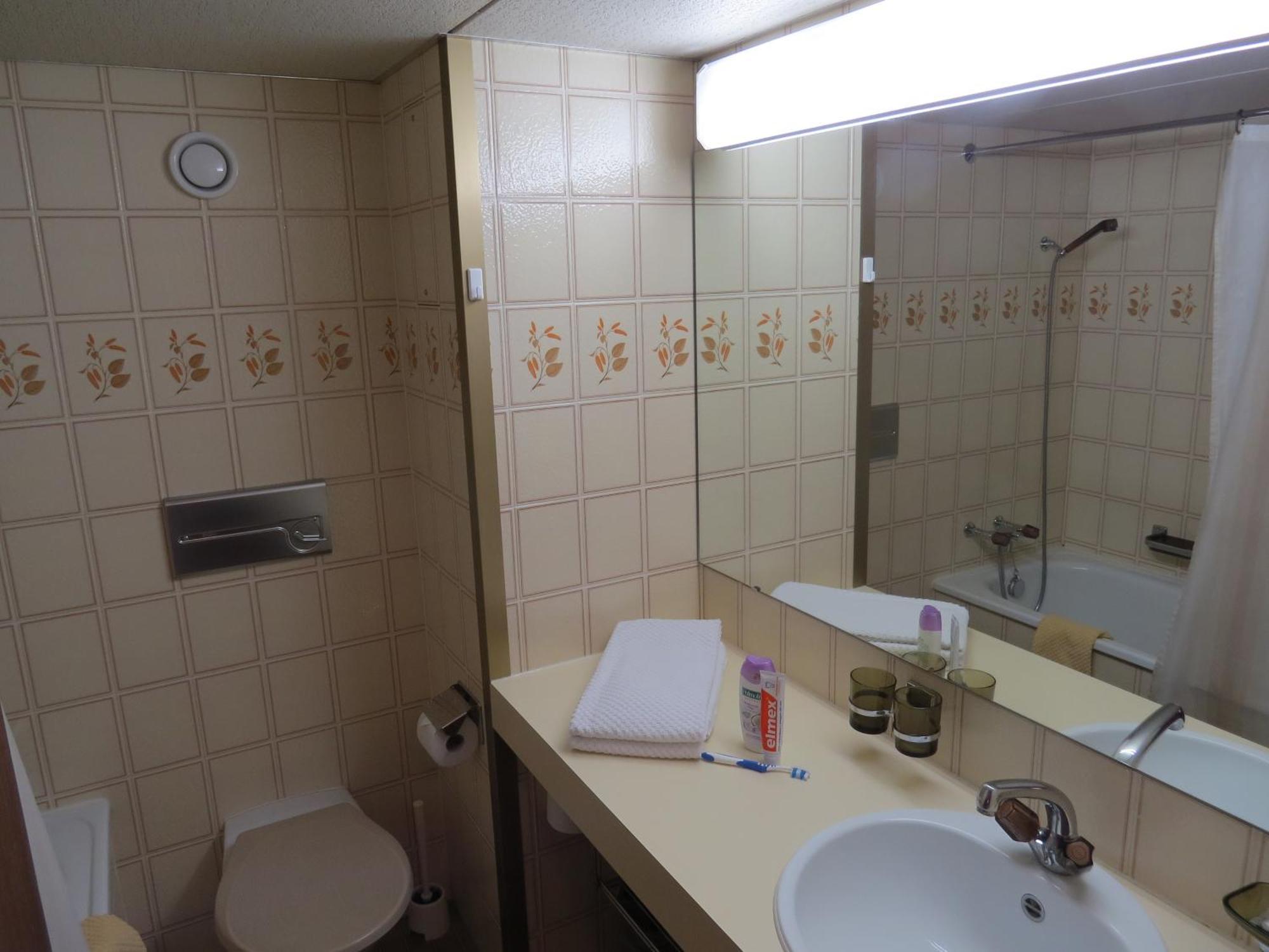 Aparthotel Hof Arosa Pokoj fotografie