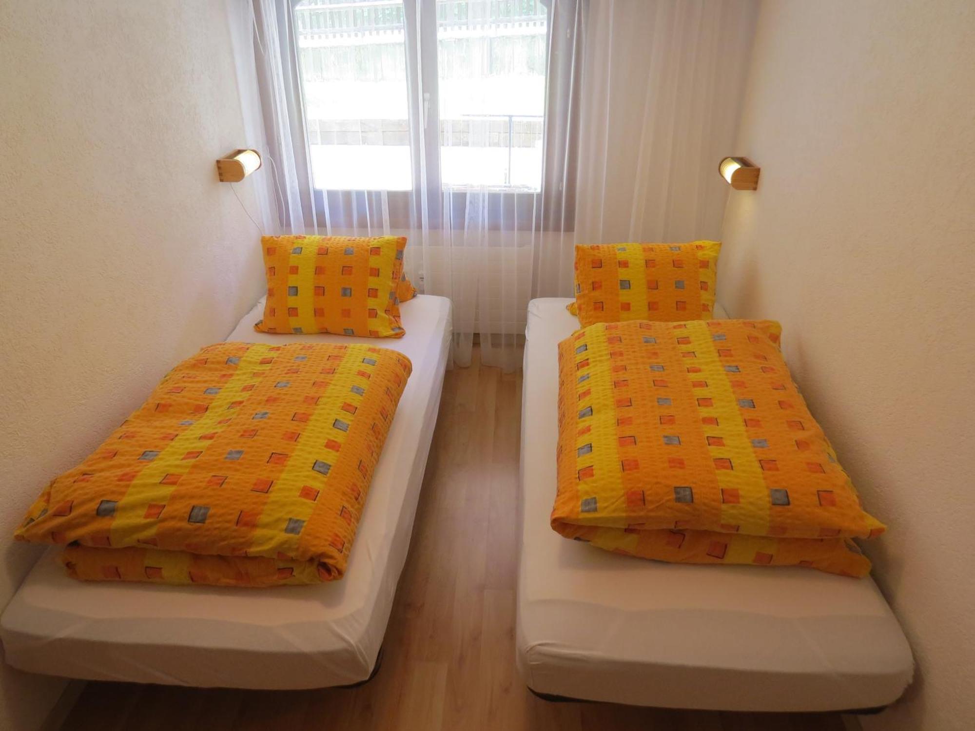 Aparthotel Hof Arosa Pokoj fotografie